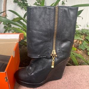 Black leather knee high boots, size 8. Steven by Steve Madden.